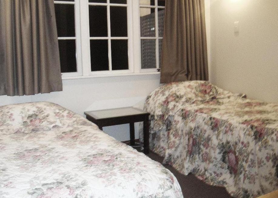 Browns Bay Olive Tree Motel & Apartment Okura Bush Habitación foto